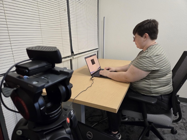 Example of a student using a tripod for side-angle recording